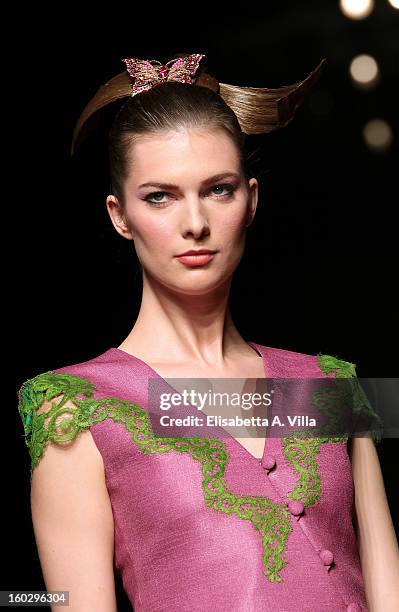 Model walks the runway during Jamal Taslaq S/S 2013 Haute Couture colletion fashion show as part of AltaRoma AltaModa Fashion Week at Santo Spirito...