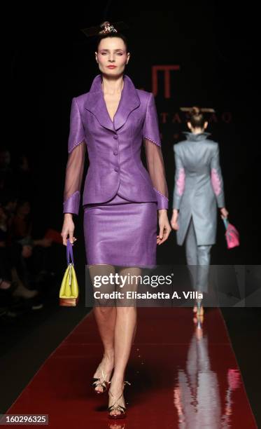 Model walks the runway during Jamal Taslaq S/S 2013 Haute Couture colletion fashion show as part of AltaRoma AltaModa Fashion Week at Santo Spirito...