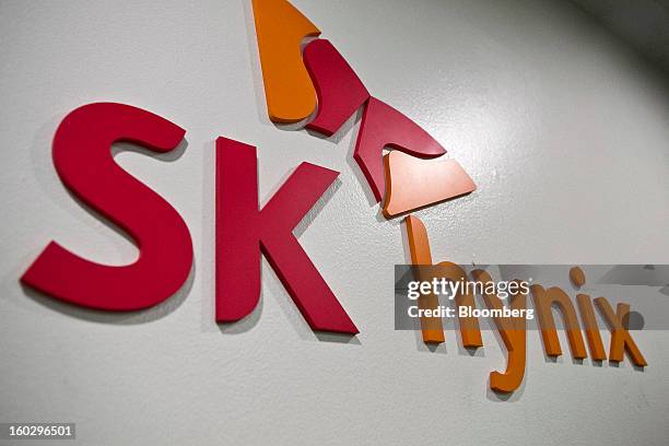 The SK Hynix Inc. Logo is displayed at the company's headquarters in Seoul, South Korea, on Monday, Jan. 28, 2013. Hynix is scheduled to release...