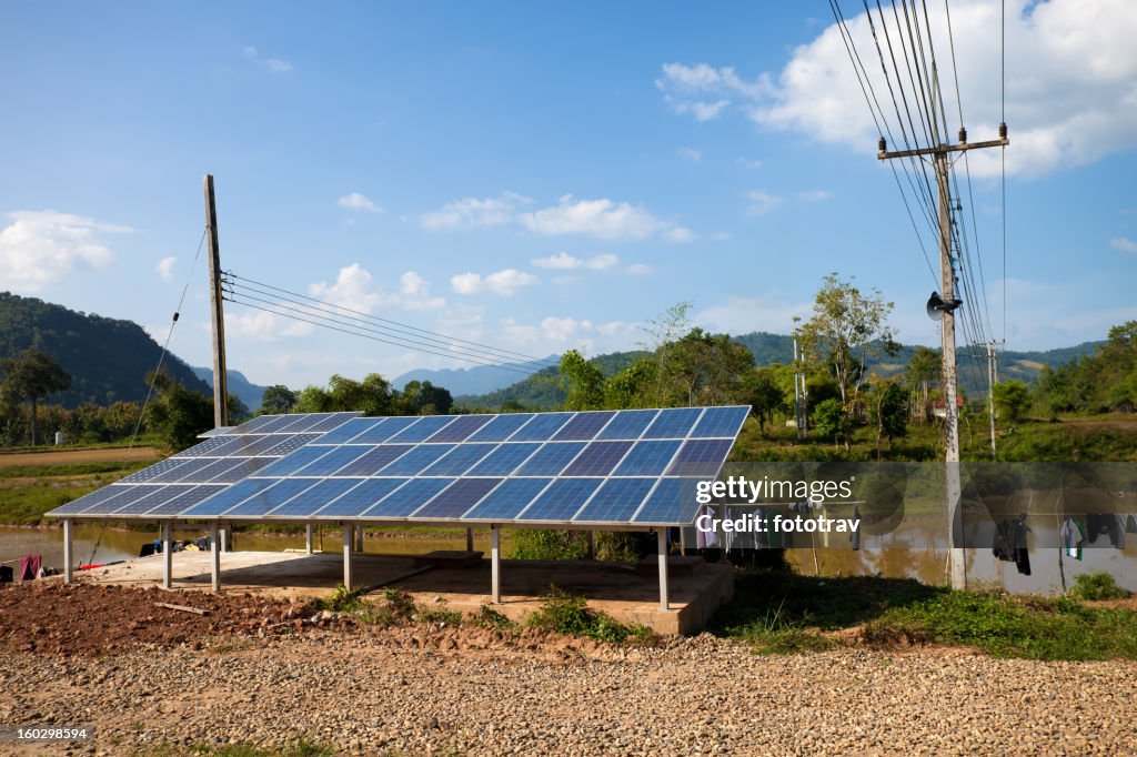 Solar panels in a backyard in rural Laos