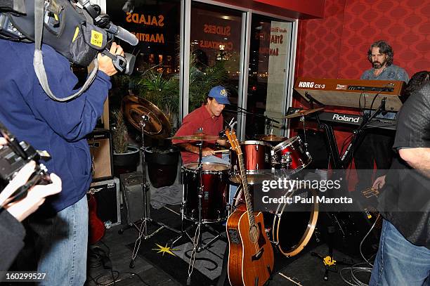 Former New England Patriots Quarterback Doug Flutie and the Flutie Brothers Band perform at the10th Annual Flutie Bowl to strike out autism at KINGS...