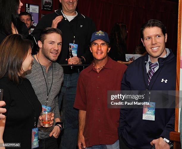 New England Patriots Wide Receiver Julian Edelman and former New England Patriots Quarterback Doug Flutie attends the10th Annual Flutie Bowl to...