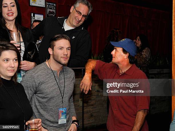 New England Patriots Wide Receiver Julian Edelman and former New England Patriots Quarterback Doug Flutie attends the10th Annual Flutie Bowl to...