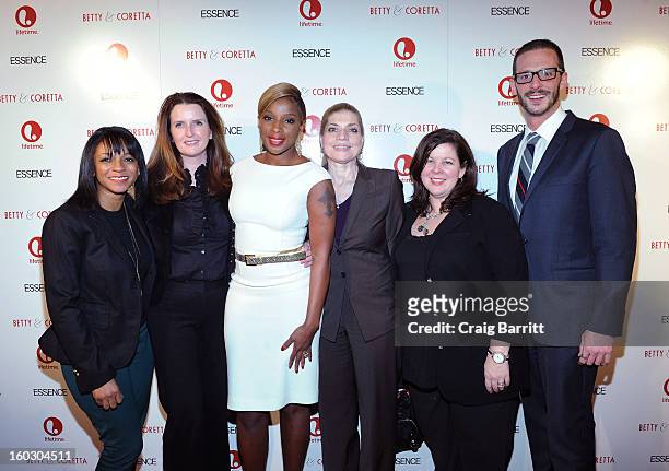 Actress Mary J. Blige poses with guests at the premiere of "Betty & Coretta" to celebrate with Lifetime and cast at Tribeca Cinemas on January 28,...