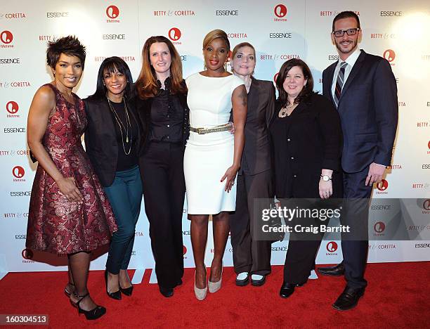 Mary J. Blige and Angela Bassett pose with guests at the premiere of "Betty & Coretta" to celebrate with Lifetime and cast at Tribeca Cinemas on...