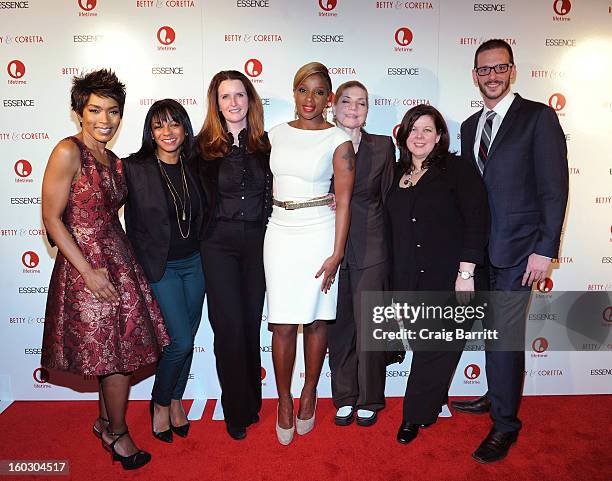 Mary J. Blige and Angela Bassett pose with guests at the premiere of "Betty & Coretta" to celebrate with Lifetime and cast at Tribeca Cinemas on...