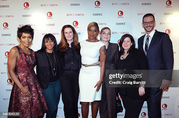 Mary J. Blige and Angela Bassett pose with guests at the premiere of "Betty & Coretta" to celebrate with Lifetime and cast at Tribeca Cinemas on...