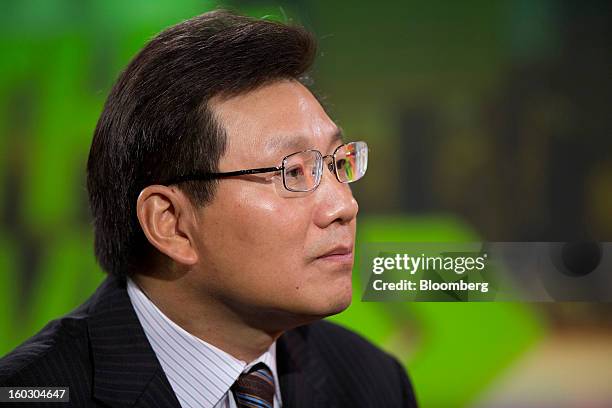 Gerry Wang, chief executive officer of Seaspan Corp., listens during an interview in Hong Kong, China, on Tuesday, Jan. 29, 2013. Seaspan is likely...
