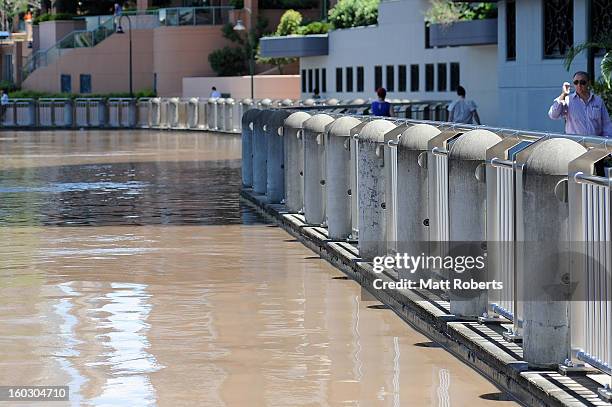 General view of the Brisbane river as it passes the high tide peak as parts of southern Queensland experiences record flooding in the wake of...