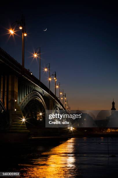 illuminated bridge at night - wiesbaden stock pictures, royalty-free photos & images