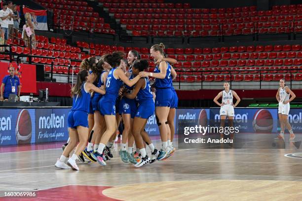 Players of Italy celebrate their victory after winning the FIBA U16 Women's European Championship match against Serbia in Izmir, Turkiye on August...