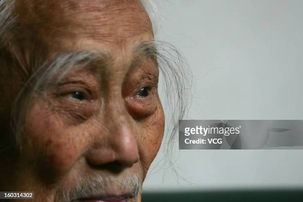 Year-old Luo Zhicheng has more than 10 centimeter long eyebrows on October 24, 2012 in Chengdu, China.