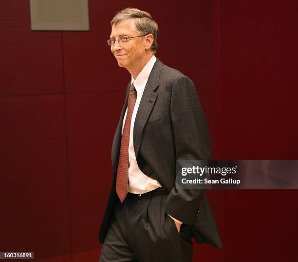 Microsoft founder Bill Gates arrives with German Development Minister Dirk Niebel to speak to the media after talks at the Development Ministry on...