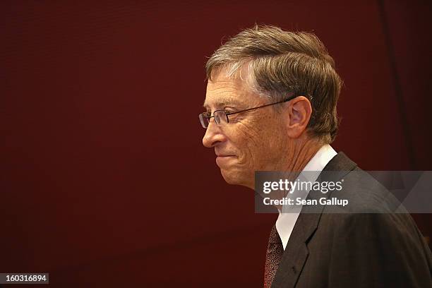 Microsoft founder Bill Gates arrives with German Development Minister Dirk Niebel to speak to the media after talks at the Development Ministry on...