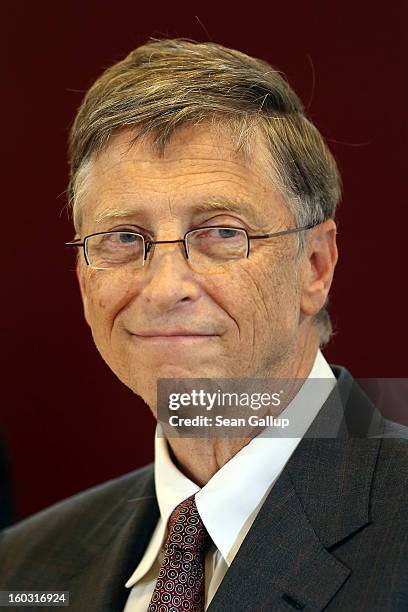 Microsoft founder Bill Gates speaks with German Development Minister Dirk Niebel to the media after talks at the Development Ministry on January 29,...