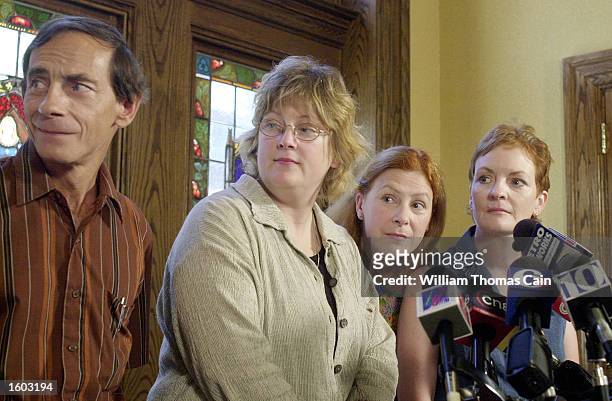 Murder victim Holly Maddux''s family, from left, John Maddux, Mary Maddux, Meg Wakeman and Buffy Hall, speak to the media July 20, 2001 in...