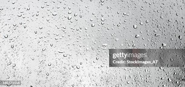 raindrops on window - wet see through stock pictures, royalty-free photos & images