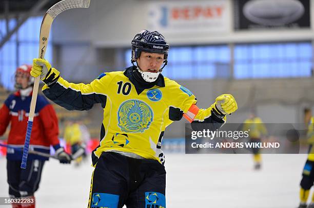 Kazakhstan's Rauan Issaliev reacts after scoring the 3-0 goal during the Bandy World Championship match between Kazakhstan and Norway in Vanersborg,...