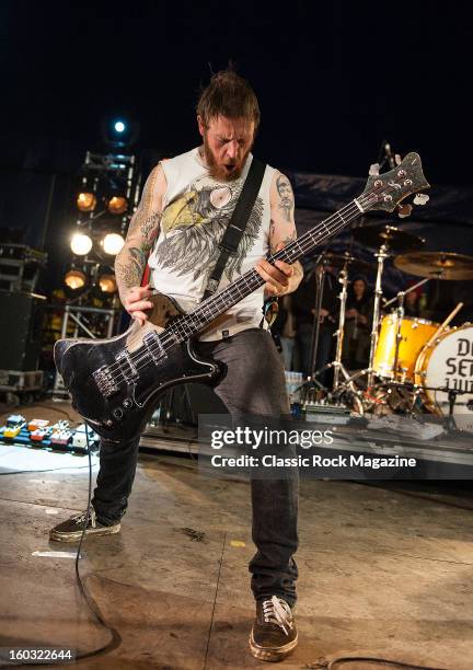 Bassist Jaye Schwarzer of Canadian hardcore group Cancer Bats performing live on the Red Bull Stage at Download Festival on June 8, 2012.