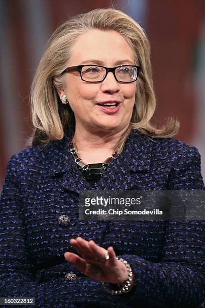 Secretary of State Hillary Clinton answers questions from students from around the world during a "Global Townterview" at the Newseum January 29,...