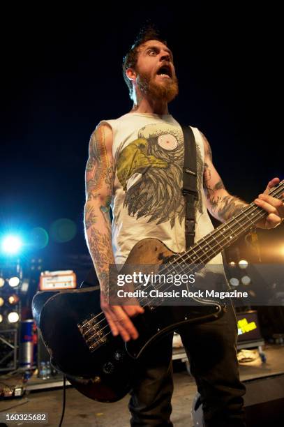 Bassist Jaye Schwarzer of Canadian hardcore group Cancer Bats performing live on the Red Bull Stage at Download Festival on June 8, 2012.