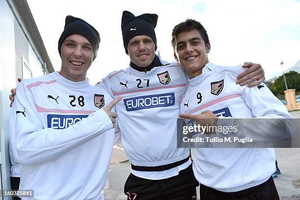 Jasmin Kurtic, Josip Ilicic and Paulo Dybala pose before a Palermo training session at Tenente Carmelo Onorato Sports Center on January 29, 2013 in...