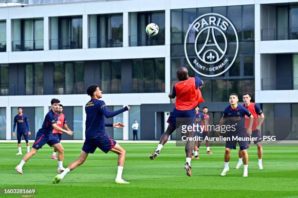Danilo jumps for the ball during the Paris Saint-Germain training session at Campus PSG on August 09, 2023 in Paris, France.