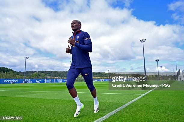 Nuno Mendes warms up during the Paris Saint-Germain training session at Campus PSG on August 09, 2023 in Paris, France.