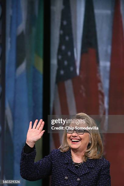 Secretary of State Hillary Clinton waves goodbye after holding a "Global Townterview" at the Newseum January 29, 2013 in Washington, DC. Clinton took...