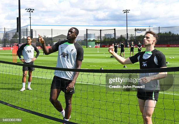 Ibrahima Konate and Diogo Jota of Liverpool during a training session at AXA Training Centre on August 09, 2023 in Kirkby, England.