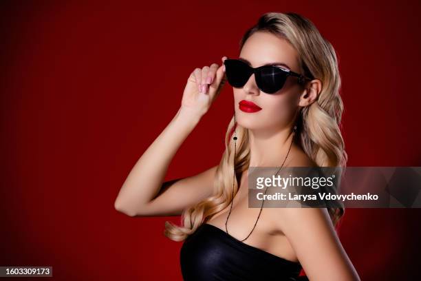 photo of lady professional secret agent spying on private cocktail party event on red color background - celebrities hair foto e immagini stock