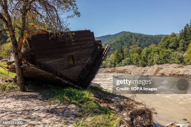 Wooden cottage is turned upside down on the bank of the river Savinja near Ljubno ob Savinji, after the country suffered severe flooding at the...