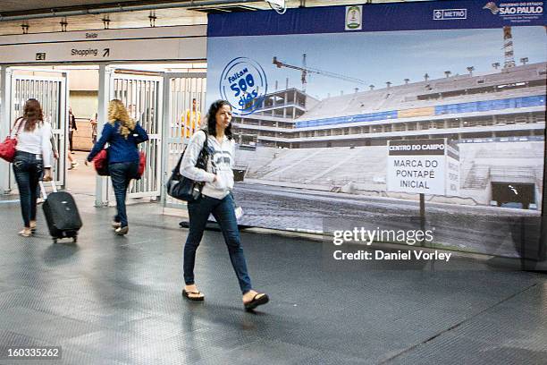 Passengers walk to the metro station Itaquera on January 29, 2013 in Sao Paulo, Brazil.