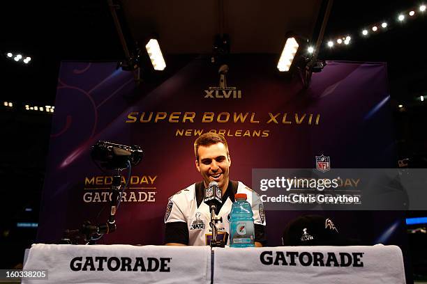 Joe Flacco of the Baltimore Ravens answers questions from the media during Super Bowl XLVII Media Day ahead of Super Bowl XLVII at the Mercedes-Benz...