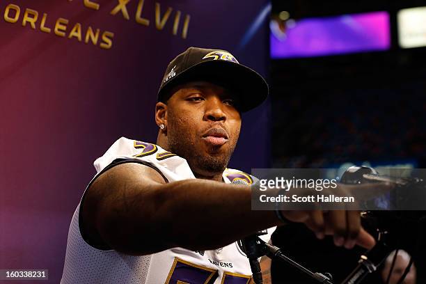 Terrell Suggs of the Baltimore Ravens answers questions from the media during Super Bowl XLVII Media Day ahead of Super Bowl XLVII at the...