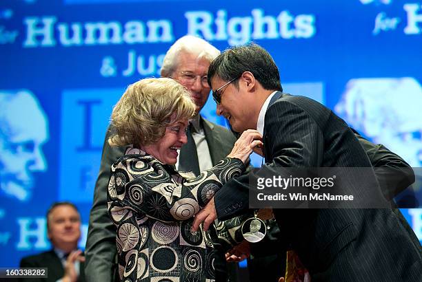 Chinese human rights activist Chen Guangcheng is awarded the 2012 Tom Lantos Human Rights Prize by Lantos' widow Annette Lantos as actor Richard Gere...