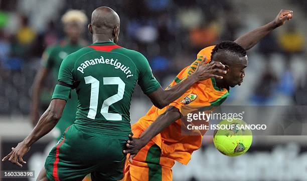 Burkina Faso defender Mady Panandetiguiri fights for the ball with Zambia forward Emmanuel Mayuka on January 29, 2013 during a 2013 Africa Cup of...