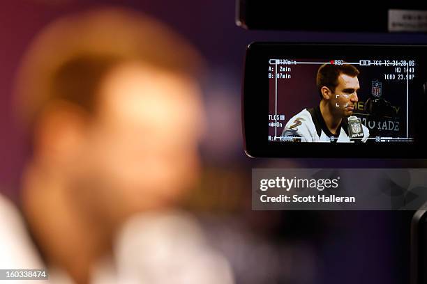 Joe Flacco of the Baltimore Ravens answers questions from the media during Super Bowl XLVII Media Day ahead of Super Bowl XLVII at the Mercedes-Benz...