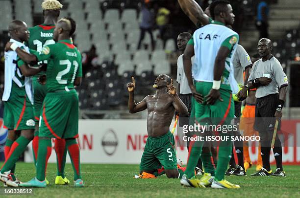 Burkina Faso players celebrate on January 29, 2013 after a 2013 Africa Cup of Nations Group C football match against Zambia at the Mbombela stadium...