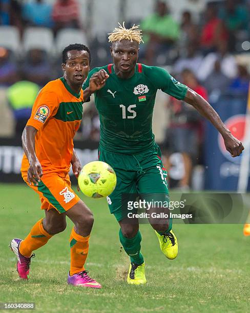 Joseph Musonda from Zambia and Aristide Bance from Burkina Faso in action during the 2013 Orange African Cup of Nations match between Burkina Faso...