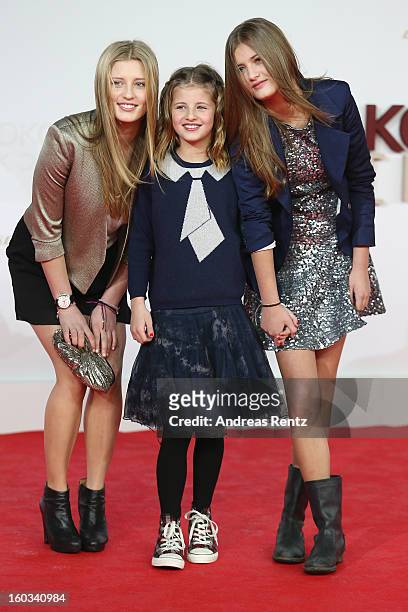 Luna Schweiger, Emma Schweiger and Lilli Schweiger attend 'Kokowaeaeh 2' - Germany Premiere at Cinestar Potsdamer Platz on January 29, 2013 in...