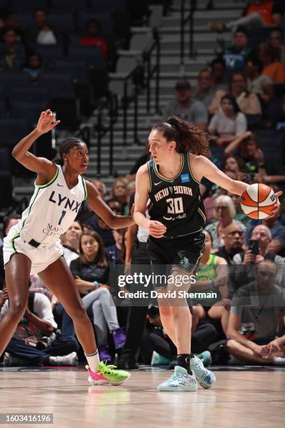 Breanna Stewart of the New York Liberty looks to pass the ball during the game against the Minnesota Lynx on August 4, 2023 at Target Center in...