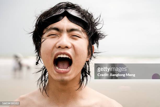 a boy with a funny expression - open workouts stock pictures, royalty-free photos & images
