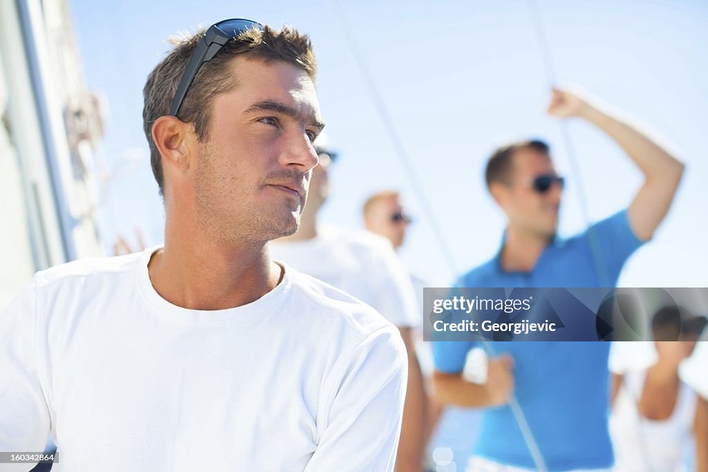 Man posing on the sailboat