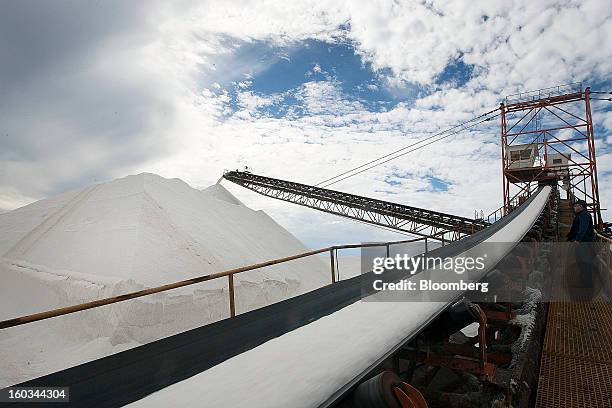 Manager Cesar Martinez inspects salt being stacked at the Exportadora de Sal salt-transshipment facility on Cedros Island off the coast of Guerrero...