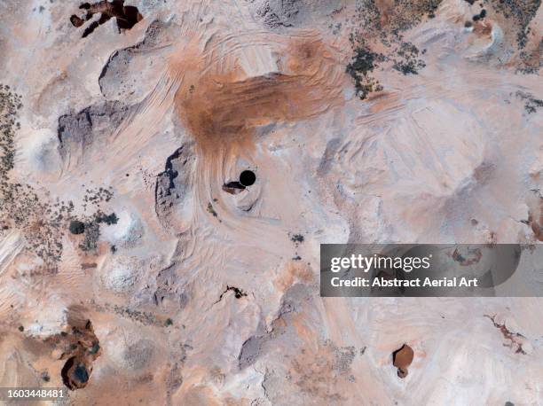 drone photo looking down on dugouts left from opal mining, coober pedy, south australia, australia - opal stock pictures, royalty-free photos & images