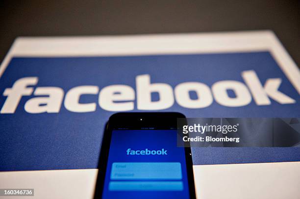 The login page for the Facebook Inc. Mobile application is displayed on an Apple Inc. IPhone 5 in Tiskilwa, Illinois, U.S., on Tuesday, Jan. 29,...
