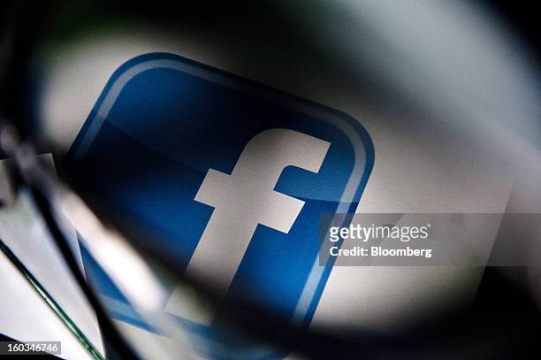 Facebook Inc. Logo is displayed for a photograph in Tiskilwa, Illinois, U.S., on Tuesday, Jan. 29, 2013. Facebook Inc. Is scheduled to report...