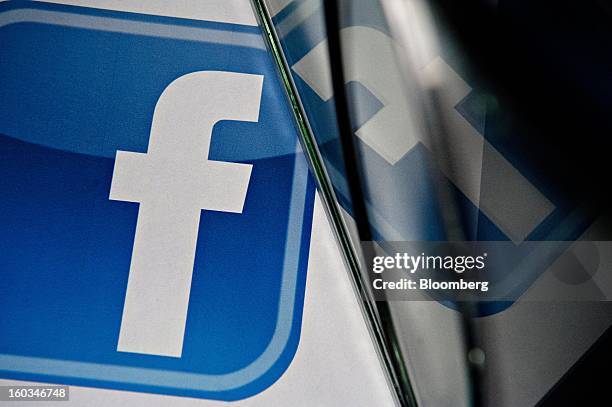 Facebook Inc. Logo is displayed for a photograph in Tiskilwa, Illinois, U.S., on Tuesday, Jan. 29, 2013. Facebook Inc. Is scheduled to report...