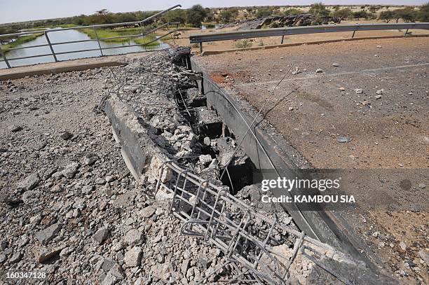 View of a bridge blown up by the Movement for Jihad and Oneness near Ansongo, a town south of the northern Malian city of Gao on January 29, 2013....